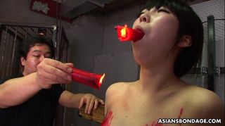 Asian bitch loves to be bdsm treated to a wax show