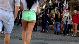 Hot Girl with booty shorts walking on the street