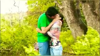 Sweet kissing Indian college girl outdoor romance