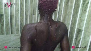 African goddess showers and shows off ass
