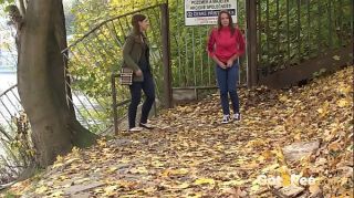 Brunette Friends Piss Together By River
