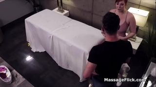 Milking cock under the table during massage