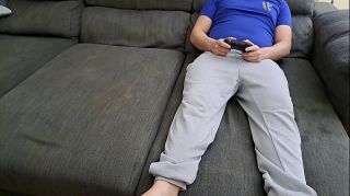 Stepsister sucks stepbrother and eats his sperm while he plays video games