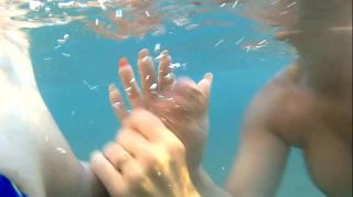 Amazing public beach water fuck with underwater blowjob